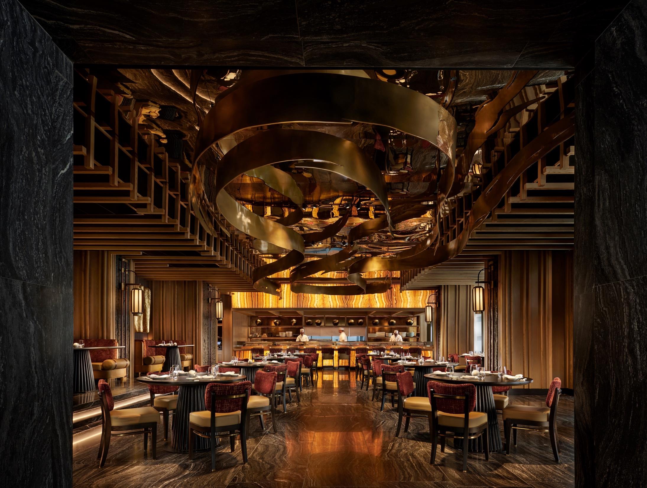Nobu Bangkok main dining room with sculptural gold ceiling – interior by THAT'S ITH with Rockwell Group
